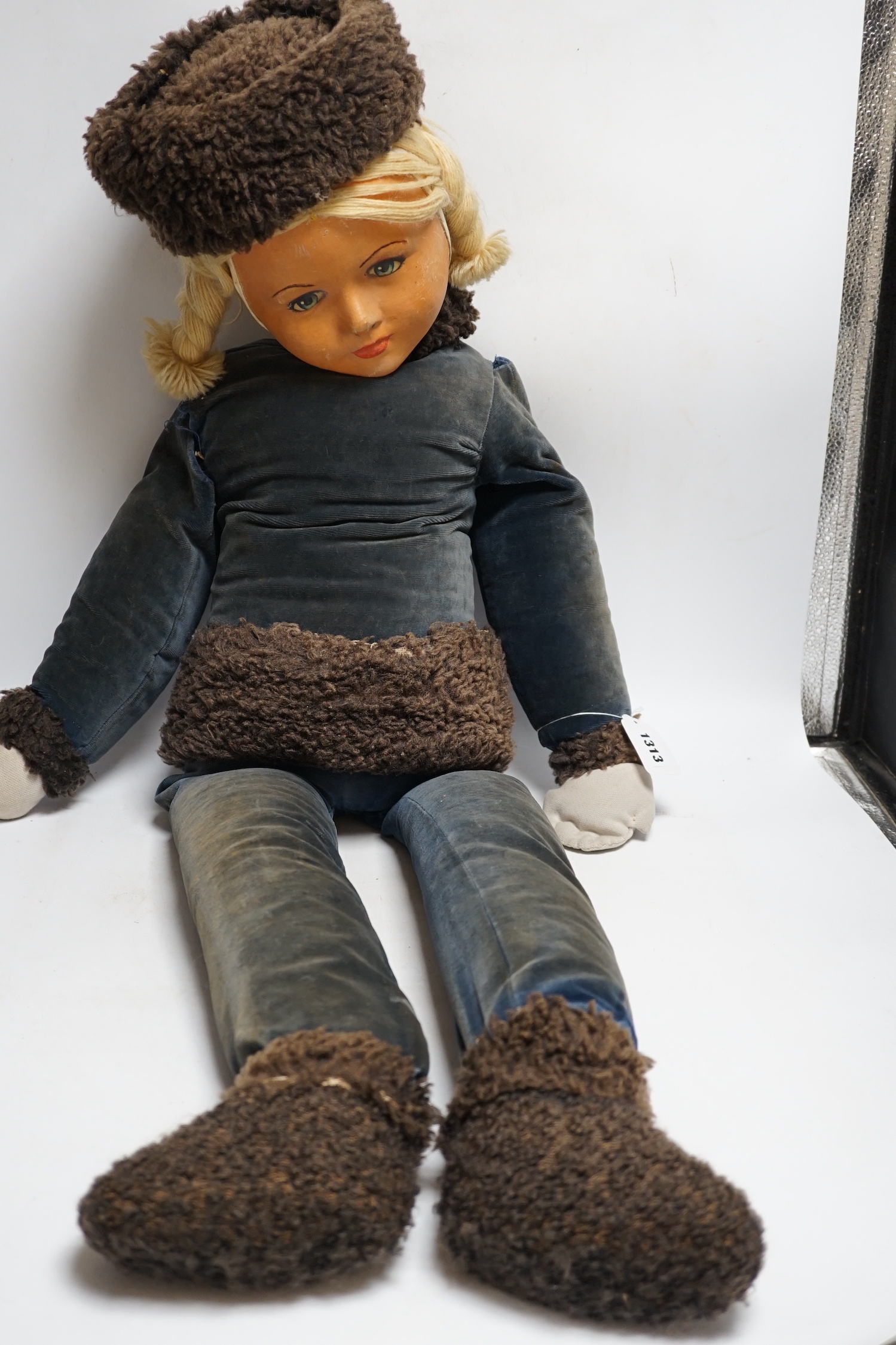 A large Dean's Ragbook cloth doll, circa 1937, Sonja Henie. Some slight rubbing on face, one arm loose, costume all original but faded 112cm